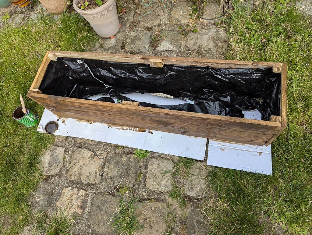 Bâche à l'intérieur de la jardinière